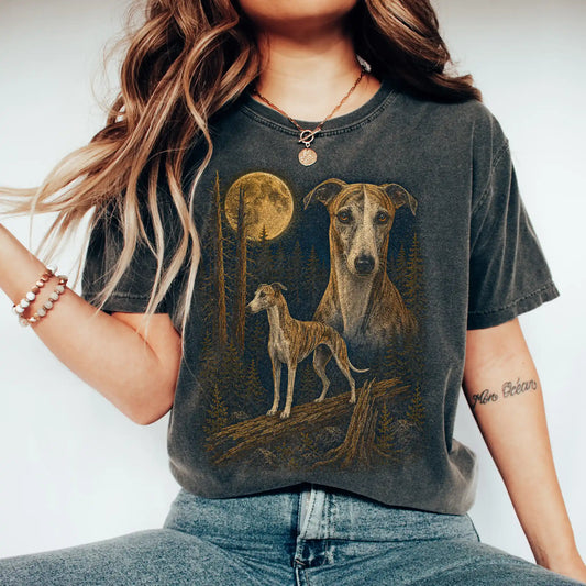 Person wearing a Pepper Whippet Wildwood Moon t-shirt