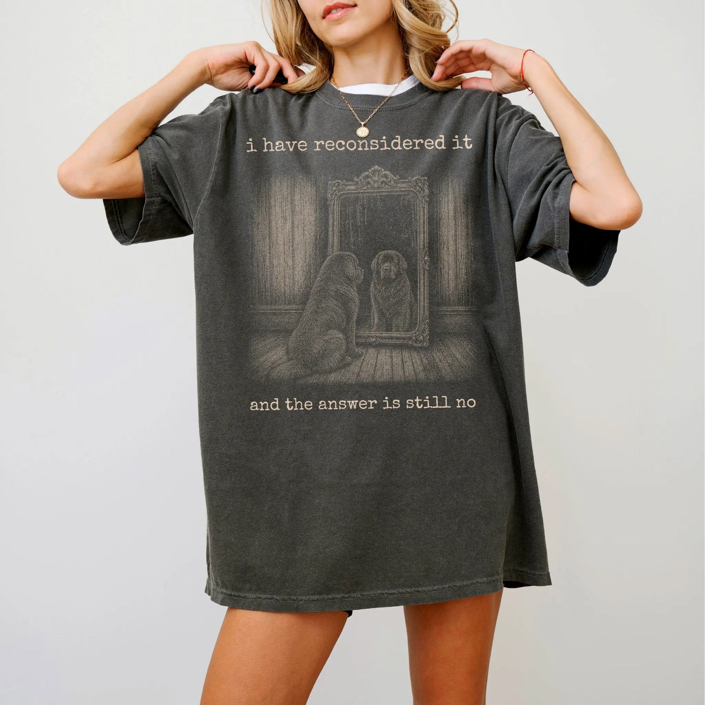 Model wearing a Pepper Comfort Colors® T-shirt with “the answer is still no” newfie design