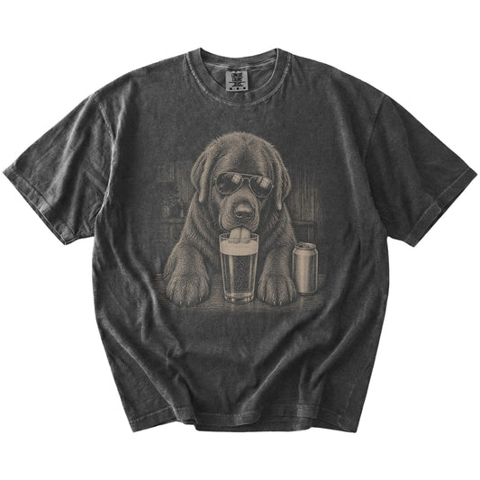 Newfie sneaking a drink from a foamy pint at home on a Pepper Comfort Colors® t-shirt