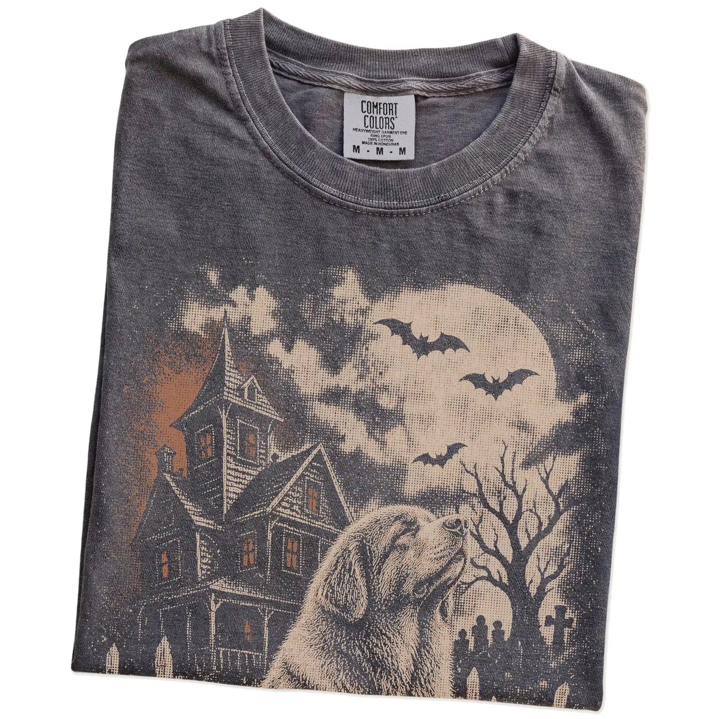 Folded Pepper Comfort Colors® T-shirt showing Newfie in a vintage haunted-house scene