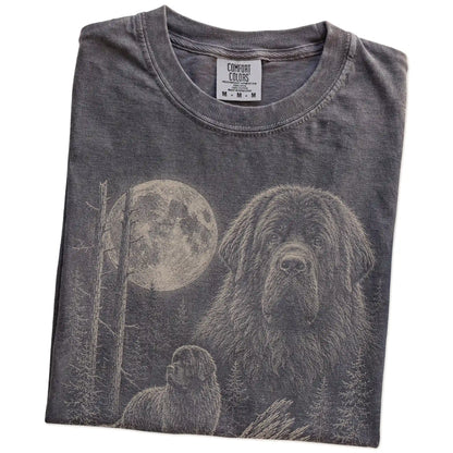 Folded Pepper Newfie Moonlit Forest T-Shirt showing the graphic