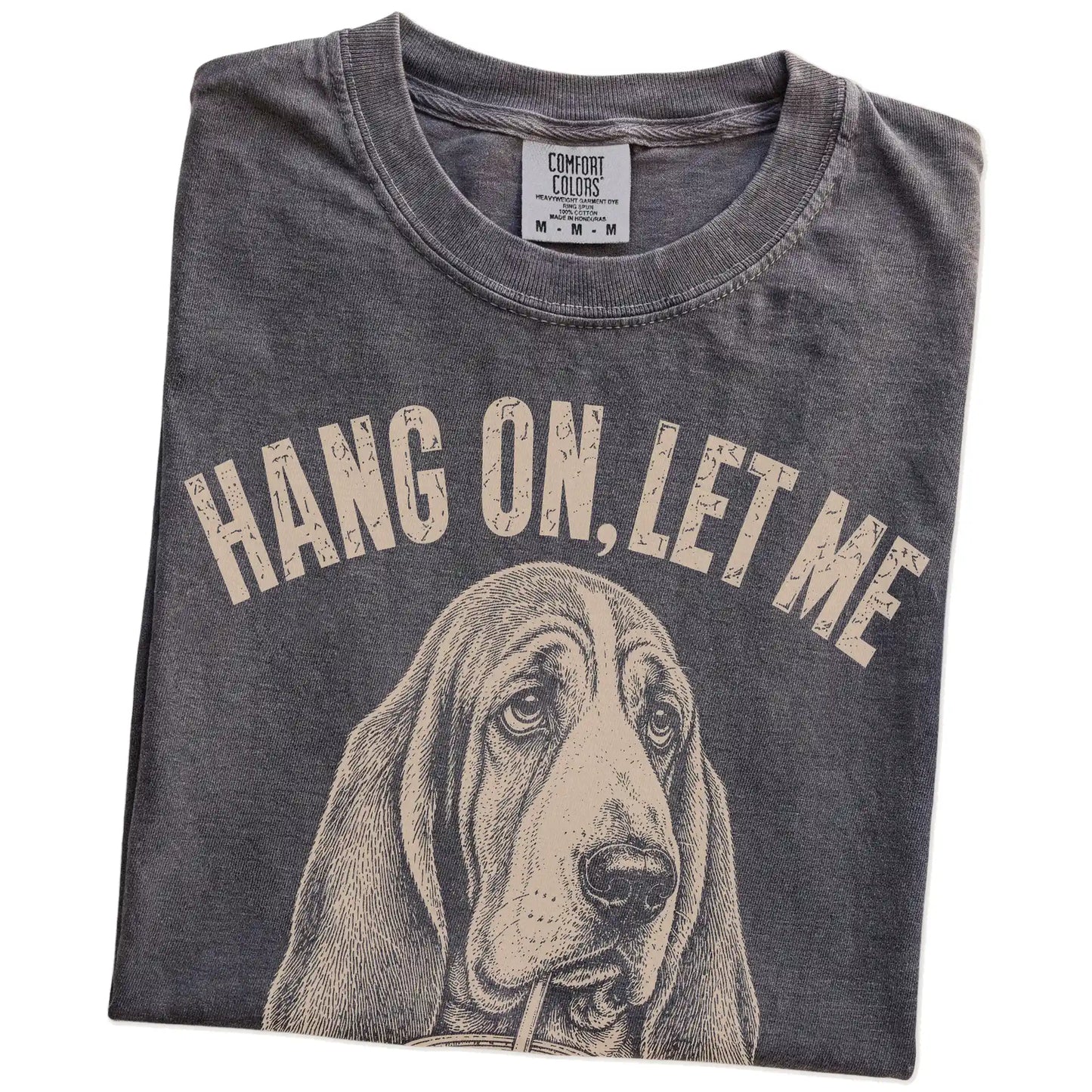 Folded Pepper Overthinking Basset Hound T-Shirt showing the graphic