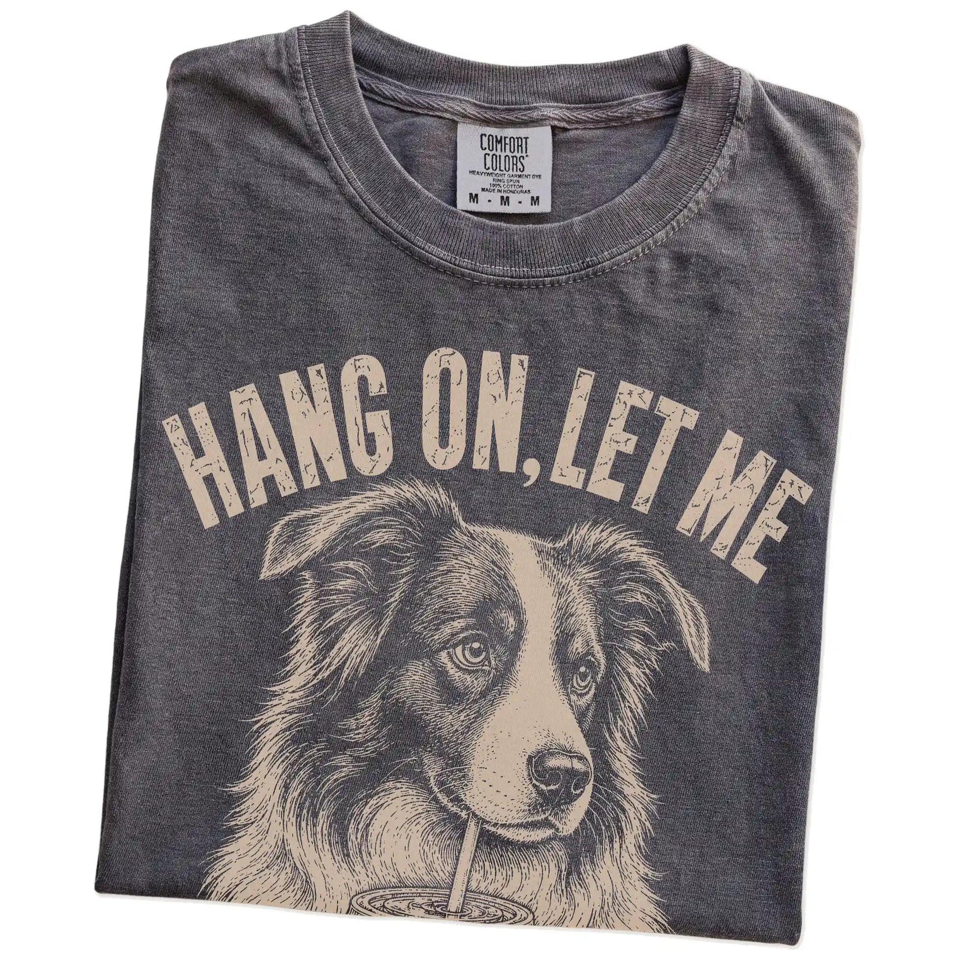 Folded Pepper Overthinking Border Collie T-Shirt showing the graphic
