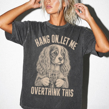 Woman wearing a Pepper Overthinking Cavalier King Charles Spaniel T-Shirt
