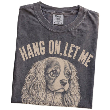 Folded Pepper Overthinking Cavalier King Charles Spaniel T-Shirt showing the graphic