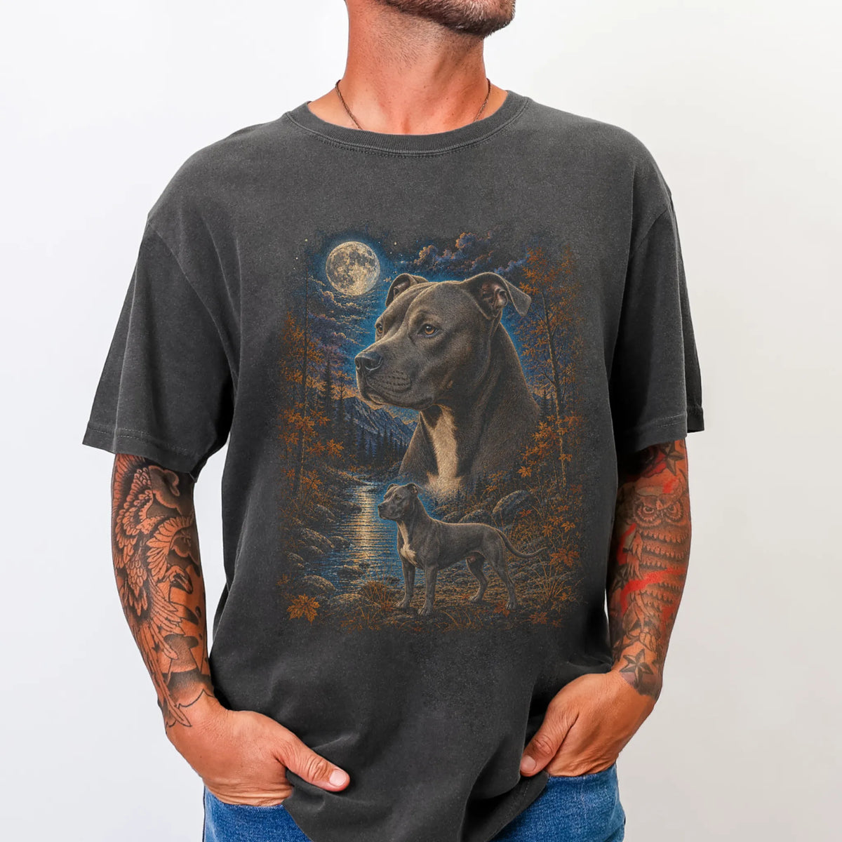 Model wearing a pepper T-shirt with Pitbull Autumn Moon artwork.