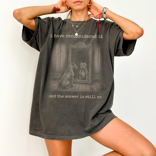 Model wearing a Pepper Comfort Colors® T-shirt with “the answer is still no” pitbull design