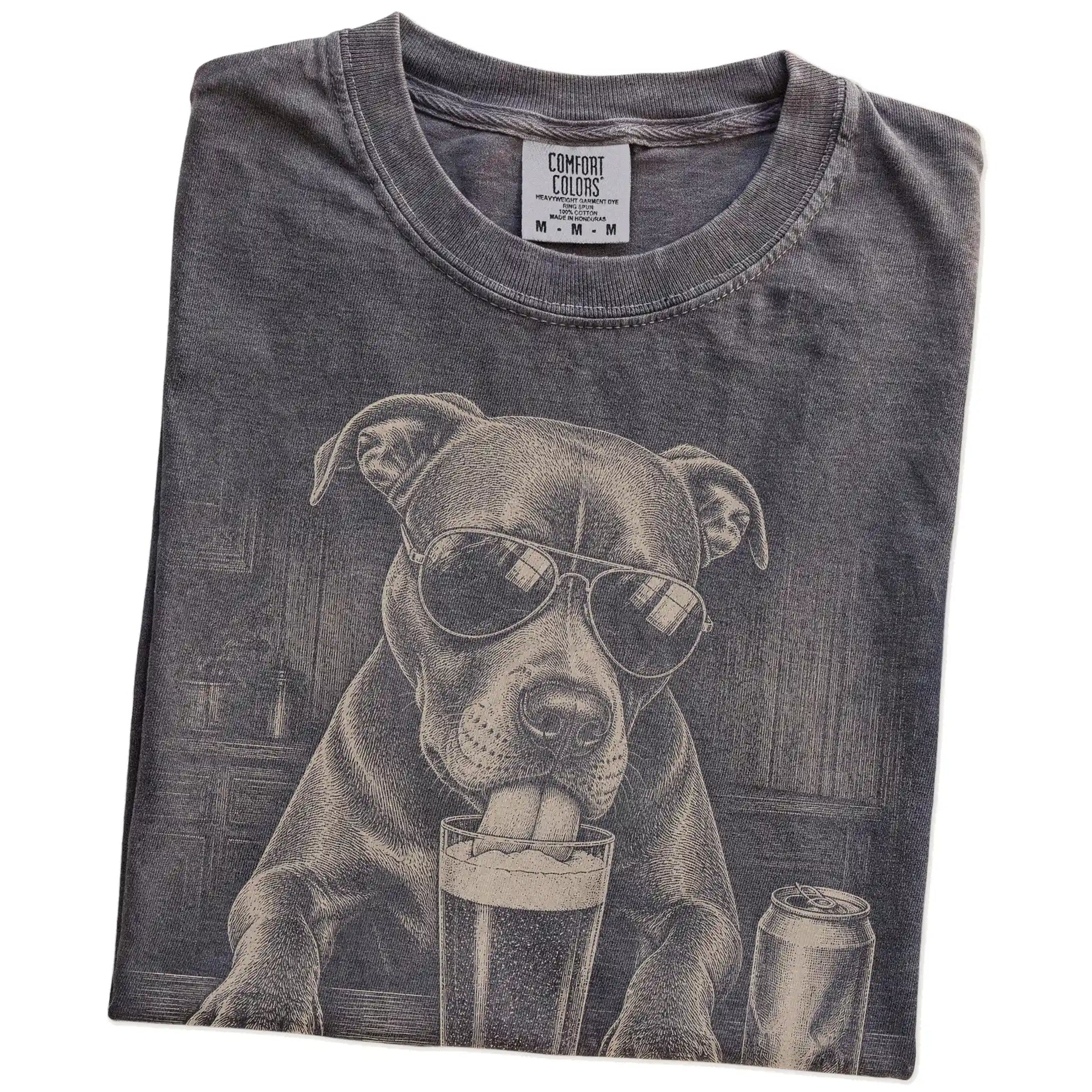 Folded Pepper Comfort Colors® t-shirt showing Pitbull sneaking a drink from a pint