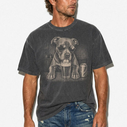 Model wearing a Pepper Comfort Colors® t-shirt with Pitbull sneaking a drink from a pint