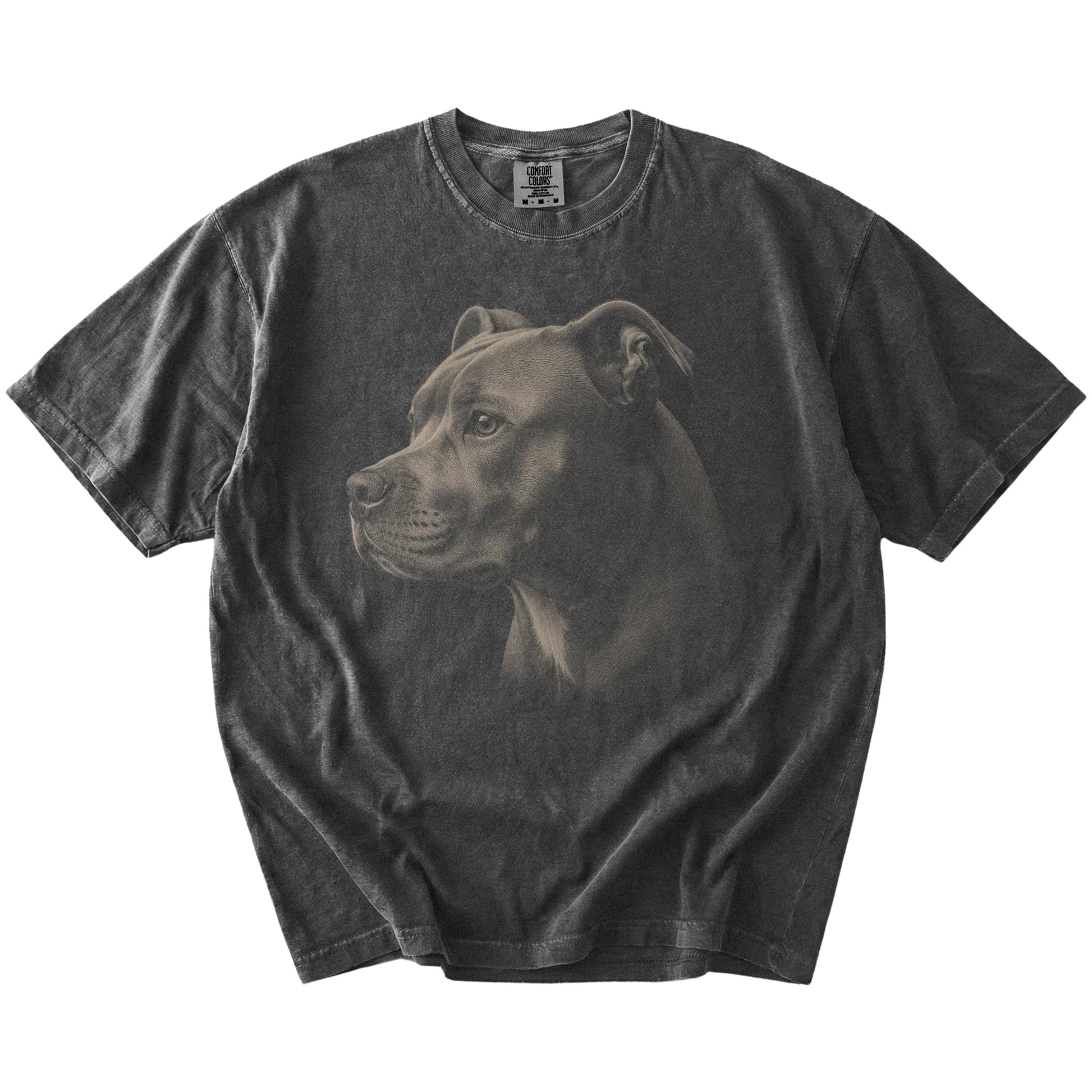 A detailed photographic portrait of a Pitbull on a Pepper Comfort Colors® T-shirt