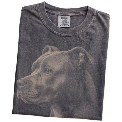 Folded Pepper Comfort Colors® T-shirt showing a detailed photographic portrait of a Pitbull