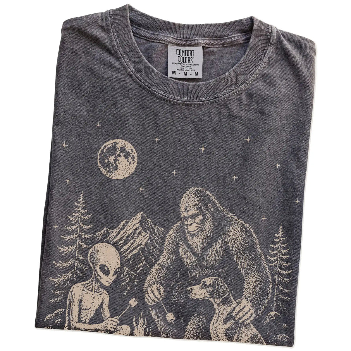 Folded Pepper Comfort Colors® T-shirt showing Pointer camping with Bigfoot and an alien