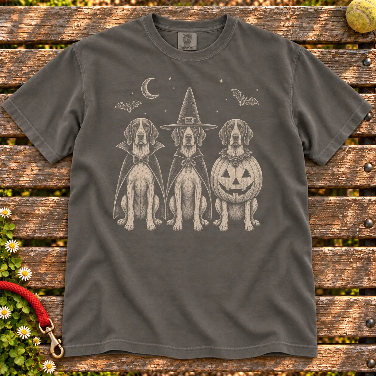 Three Pointer dogs dressed for Halloween beneath bats and a crescent moon on a Pepper Comfort Colors® T-shirt