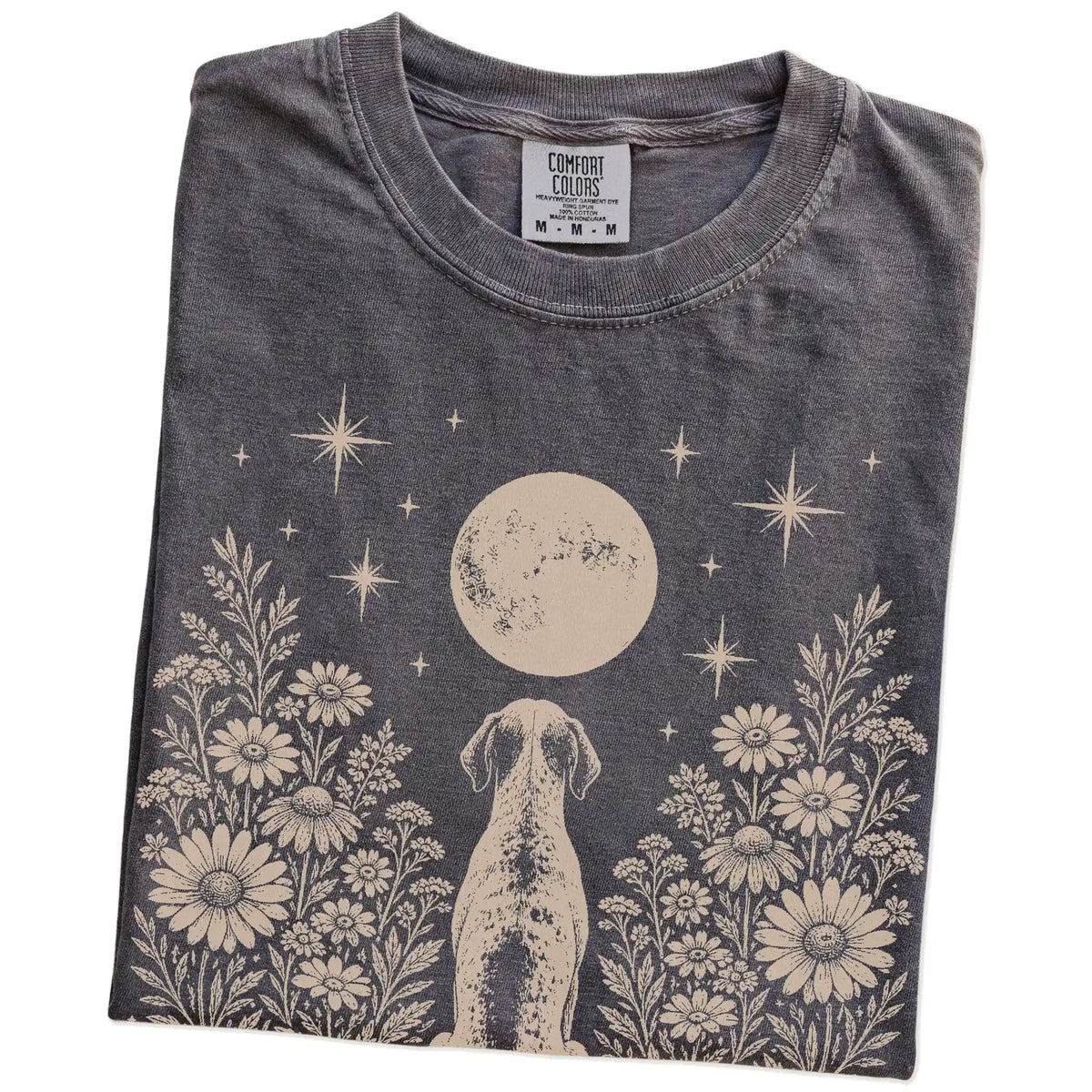Folded Pepper Comfort Colors® T-shirt showing Pointer beneath a wildflower moon