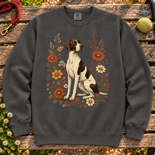 Pointer surrounded by wildflowers on a Pepper Comfort Colors® sweatshirt