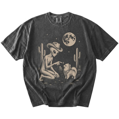 Cowboy alien fist-bumping a Pomeranian beneath the moon on a Pepper Comfort Colors® T-shirt