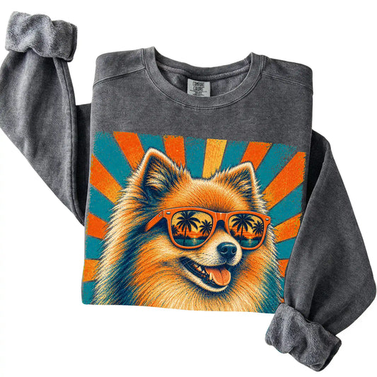 Folded Pepper Comfort Colors sweatshirt with a Retro Pomeranian Dad design