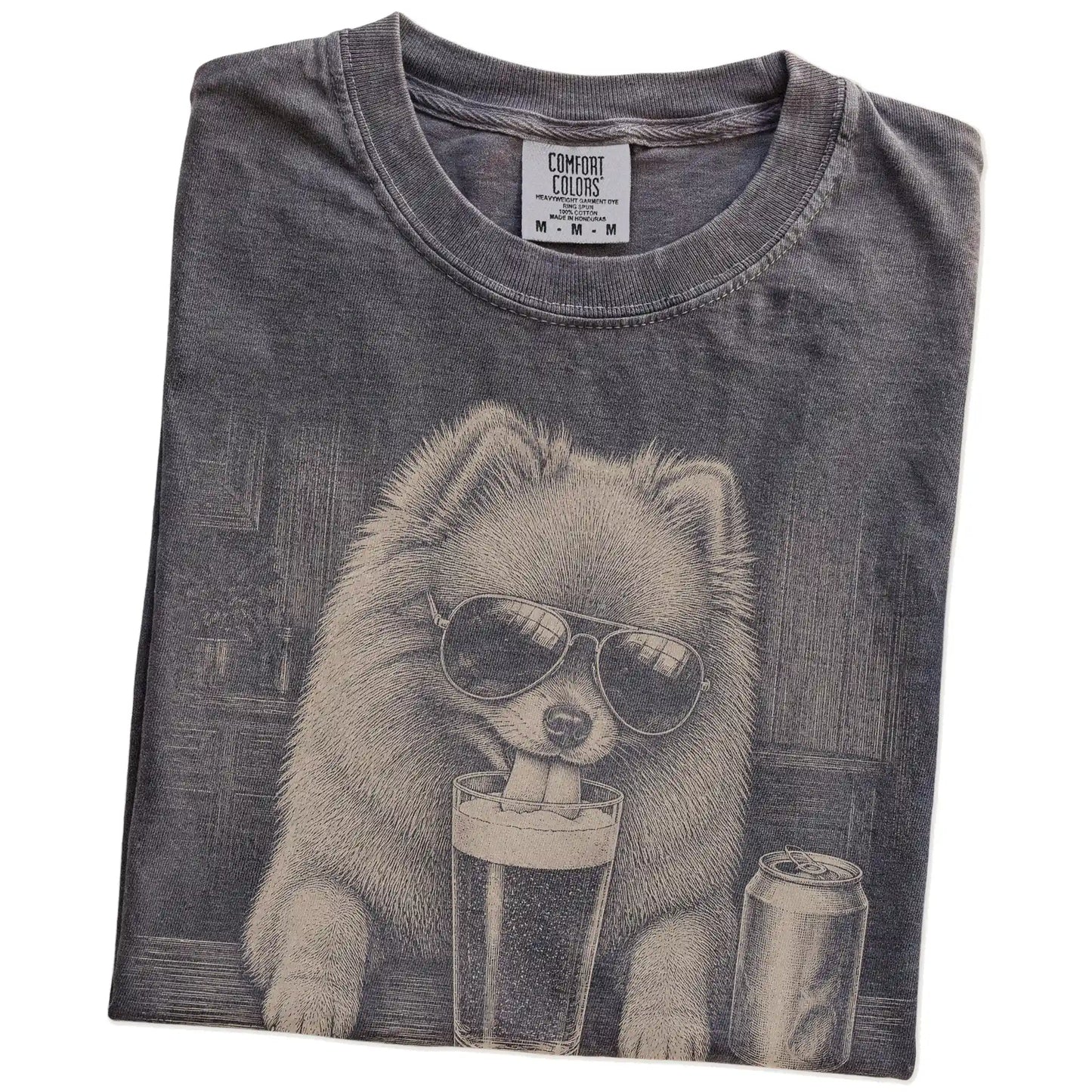 Folded Pepper Comfort Colors® t-shirt showing Pomeranian sneaking a drink from a pint