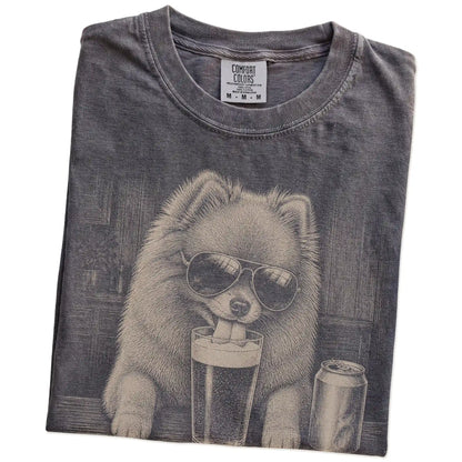 Folded Pepper Comfort Colors® t-shirt showing Pomeranian sneaking a drink from a pint