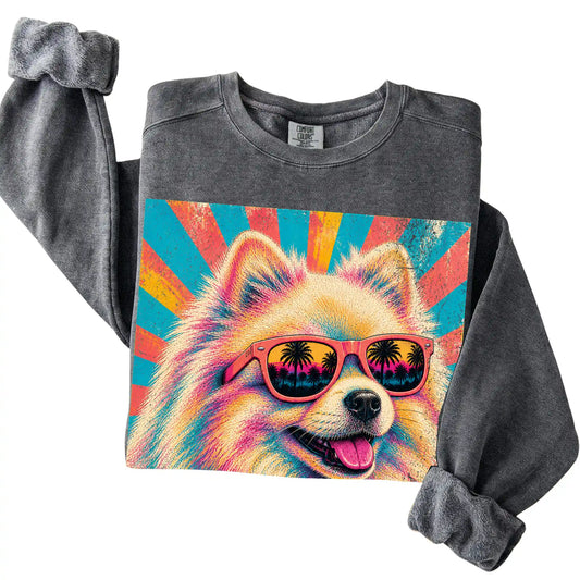 Folded Pepper Comfort Colors sweatshirt with a Retro Pomeranian Mama design