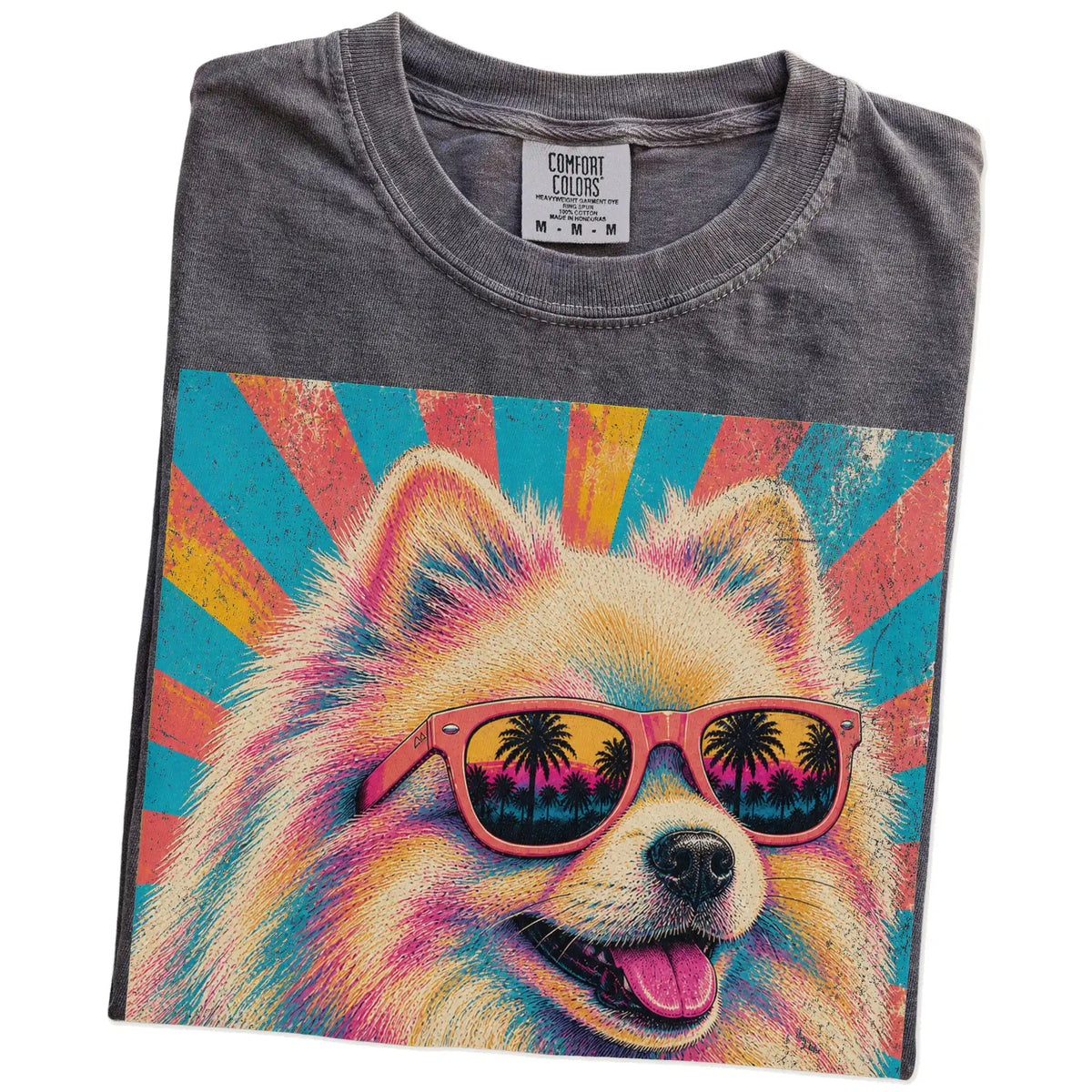 Retro Pomeranian Mama design on a Pepper Comfort Colors T-shirt folded detail