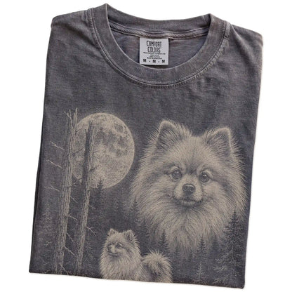 Folded Pepper Pomeranian Moonlit Forest T-Shirt showing the graphic