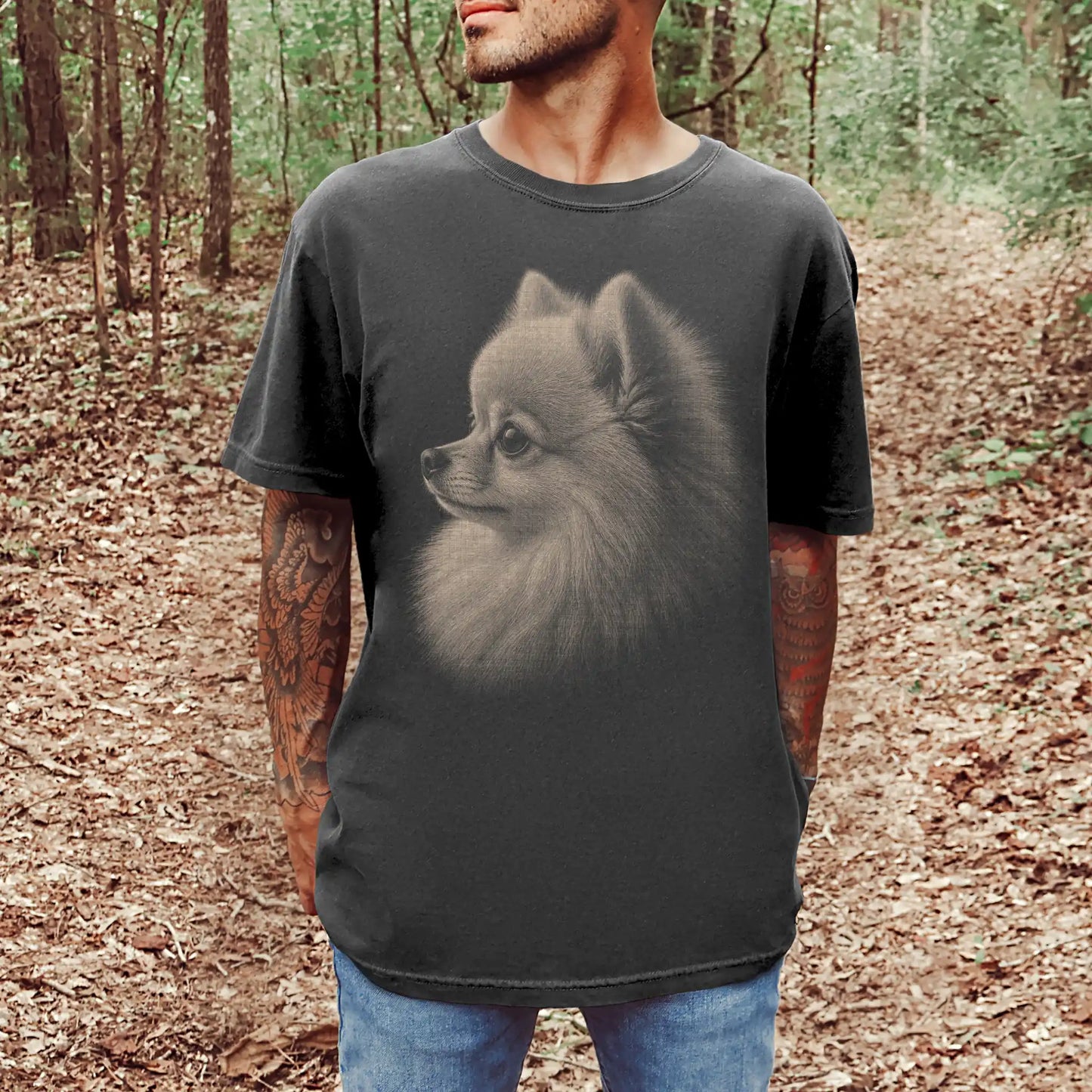 Model wearing a Pepper Comfort Colors® T-shirt with a detailed photographic portrait of a Pomeranian