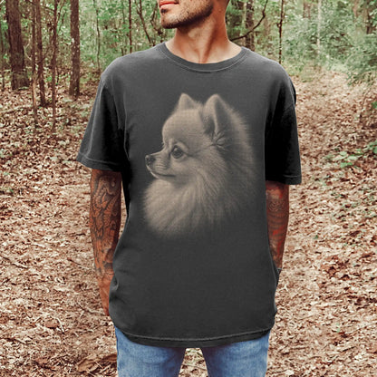 Model wearing a Pepper Comfort Colors® T-shirt with a detailed photographic portrait of a Pomeranian