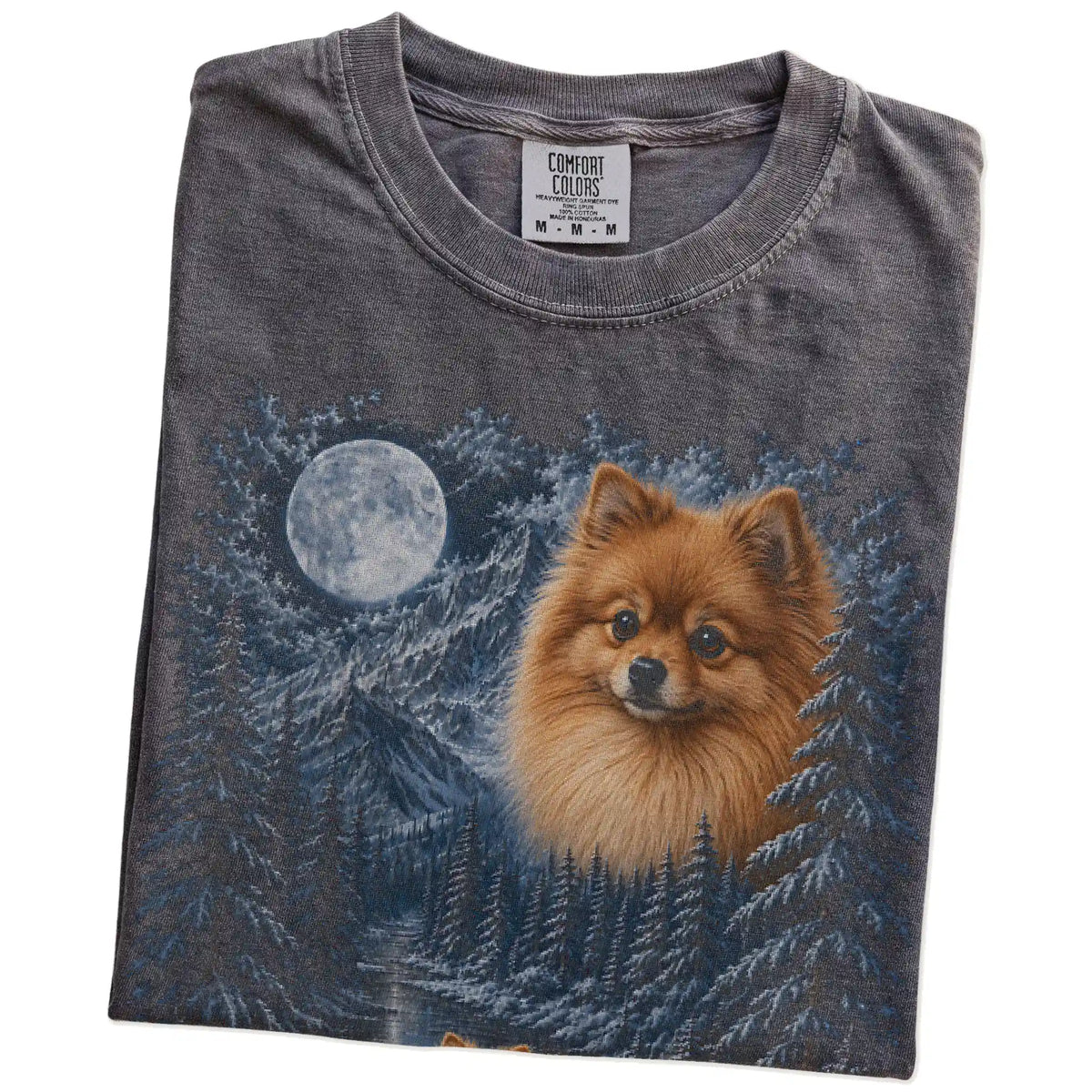 Folded pepper T-shirt with Pomeranian Winter Moon artwork.