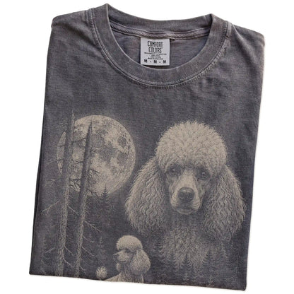 Folded Pepper Poodle Moonlit Forest T-Shirt showing the graphic