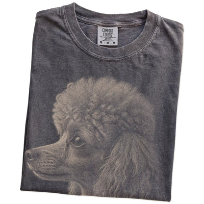 Folded Pepper Comfort Colors® T-shirt showing a detailed photographic portrait of a Poodle
