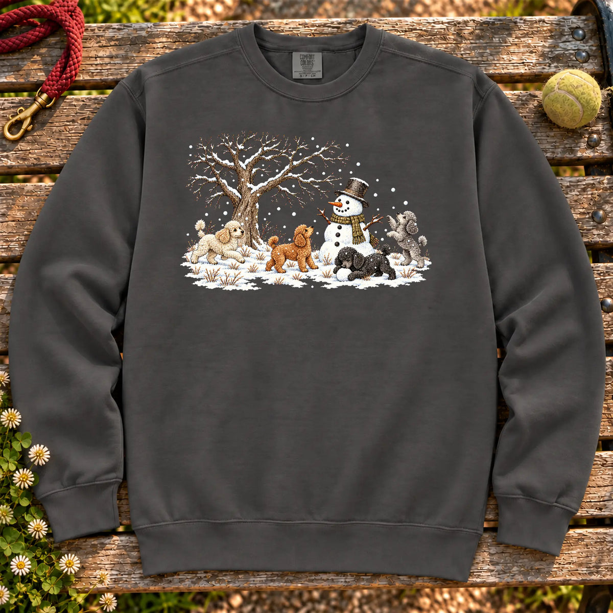 Poodle puppies playing in snow with a snowman on a Pepper sweatshirt