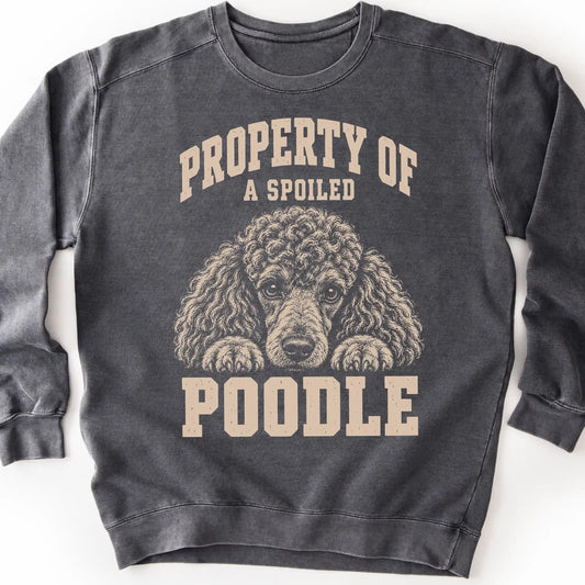 Pepper Poodle sweatshirt with a dog portrait and “Property of a Spoiled” lettering.