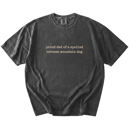 Proud Dad of a Spoiled Bernese Mountain Dog lettering on a Pepper Comfort Colors® T-shirt