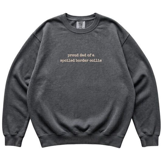 Pepper Proud Dad of a Spoiled Border Collie Comfort Colors sweatshirt laid flat