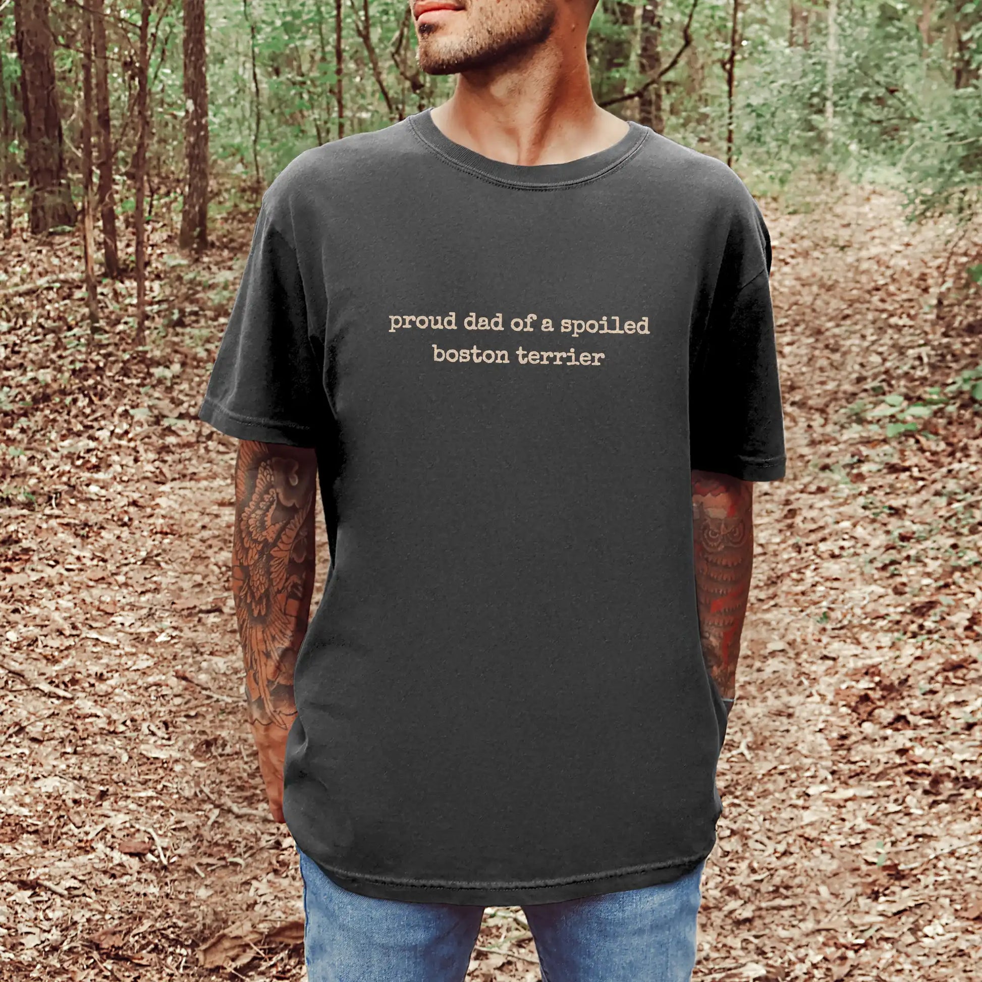 Model wearing a Pepper Comfort Colors® T-shirt with proud dad of a spoiled boston terrier lettering