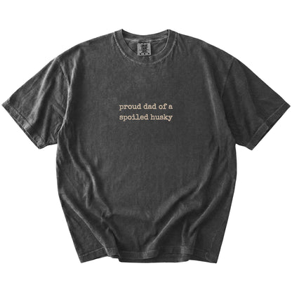 Proud Dad of a Spoiled Husky lettering on a Pepper Comfort Colors® T-shirt