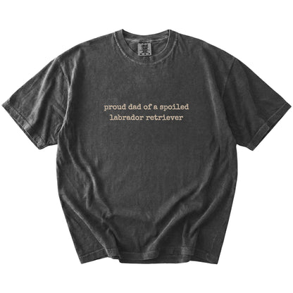 Proud Dad of a Spoiled Labrador Retriever lettering on a Pepper Comfort Colors® T-shirt