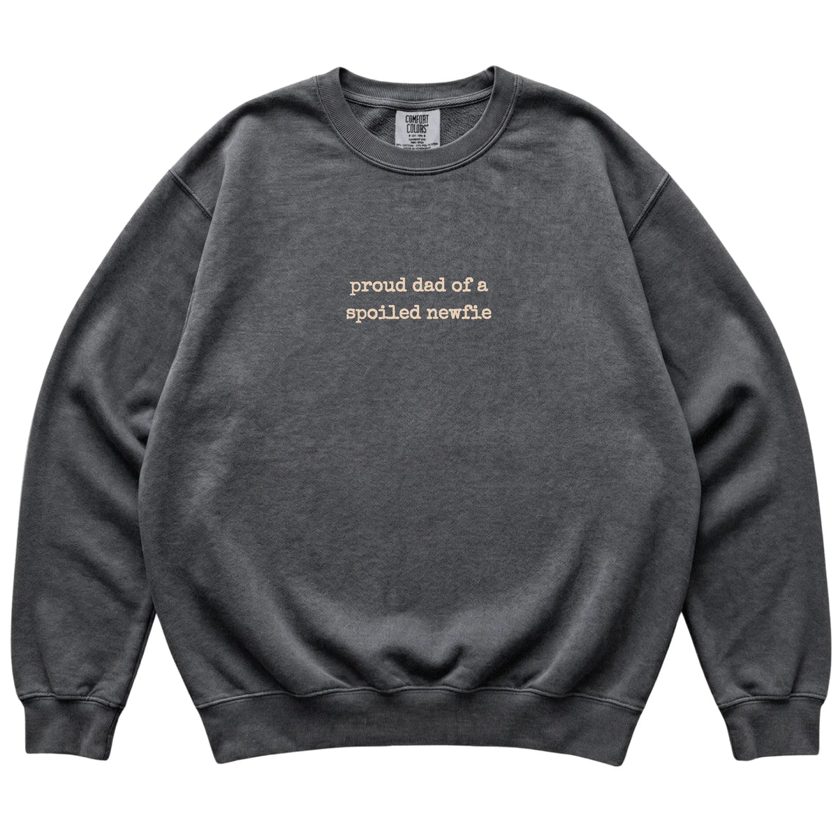 Pepper Proud Dad of a Spoiled Newfie Comfort Colors sweatshirt laid flat