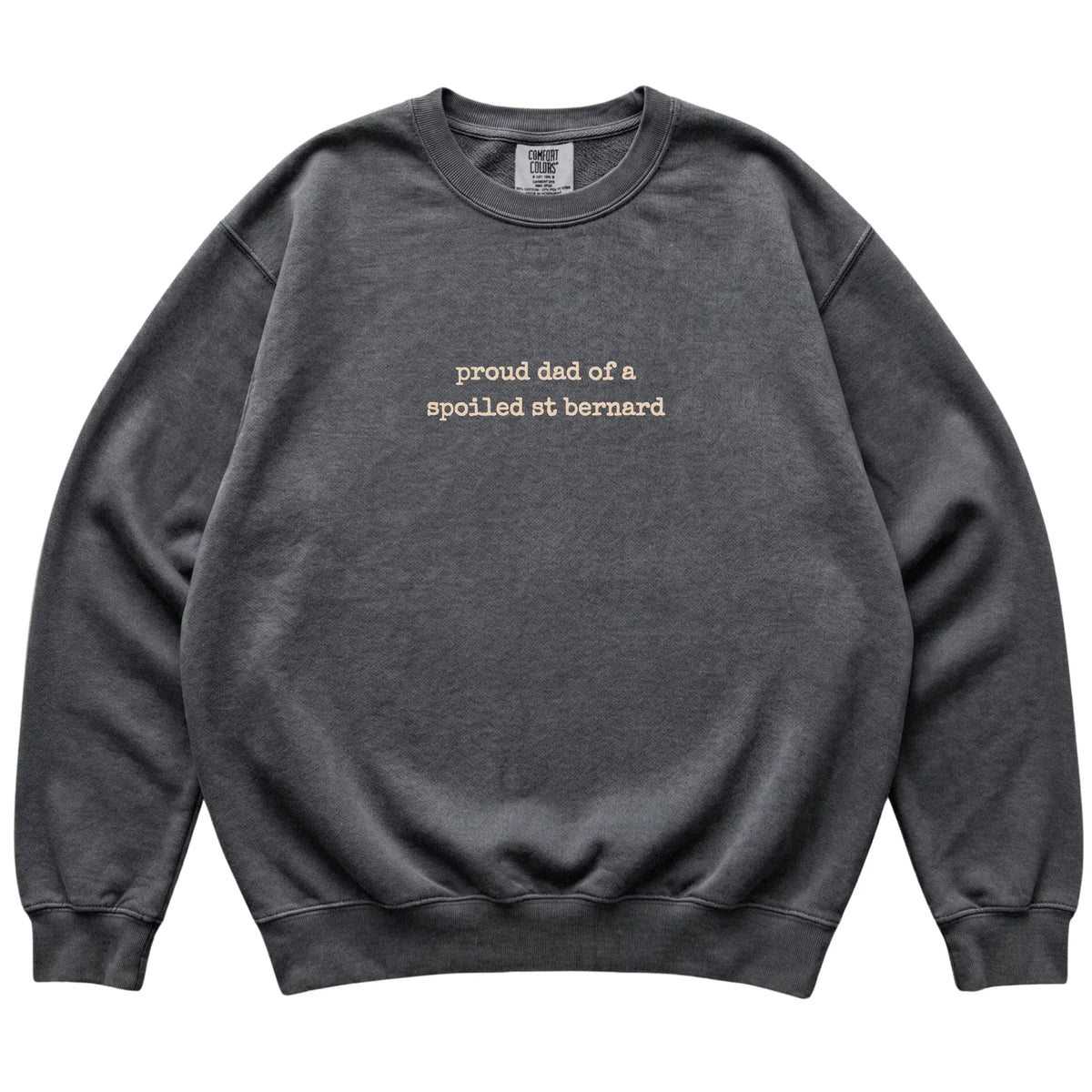 Pepper Proud Dad of a Spoiled St Bernard Comfort Colors sweatshirt laid flat