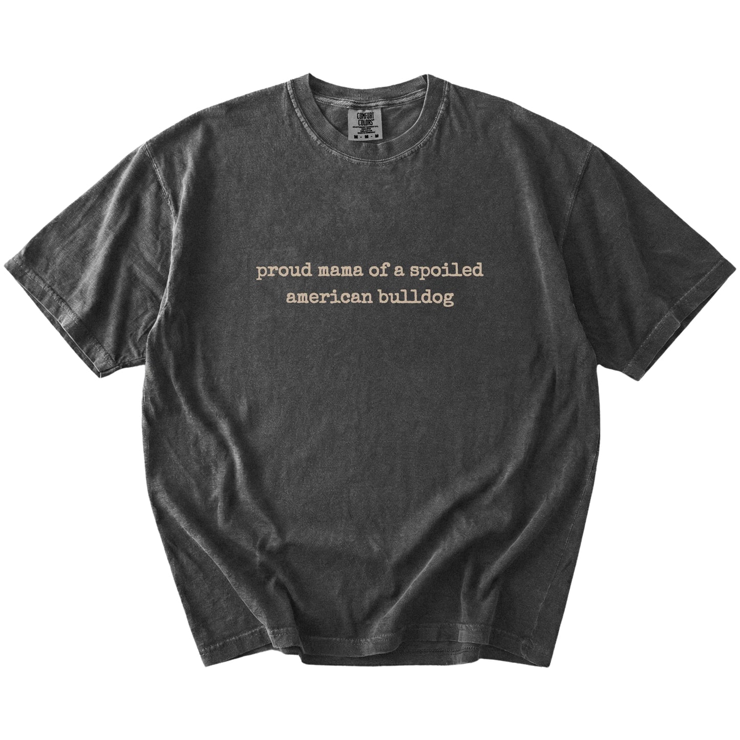 Proud Mama of a Spoiled American Bulldog lettering on a Pepper Comfort Colors® T-shirt