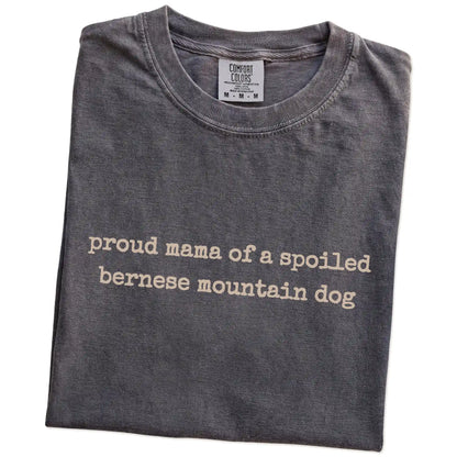 Folded Pepper Comfort Colors® T-shirt showing Proud Mama of a Spoiled Bernese Mountain Dog lettering