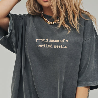 Woman wearing a Pepper Proud Mama of a Spoiled Westie shirt