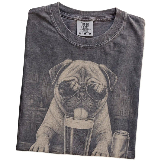 Folded Pepper Comfort Colors® t-shirt showing Pug sneaking a drink from a pint