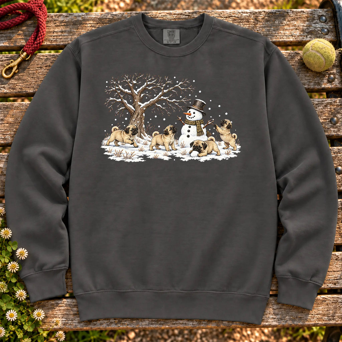 Pug puppies playing in snow with a snowman on a Pepper sweatshirt