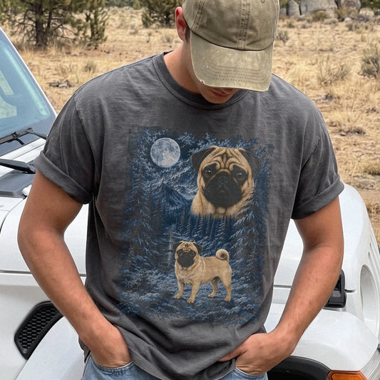 Model wearing a pepper T-shirt with Pug Winter Moon artwork.