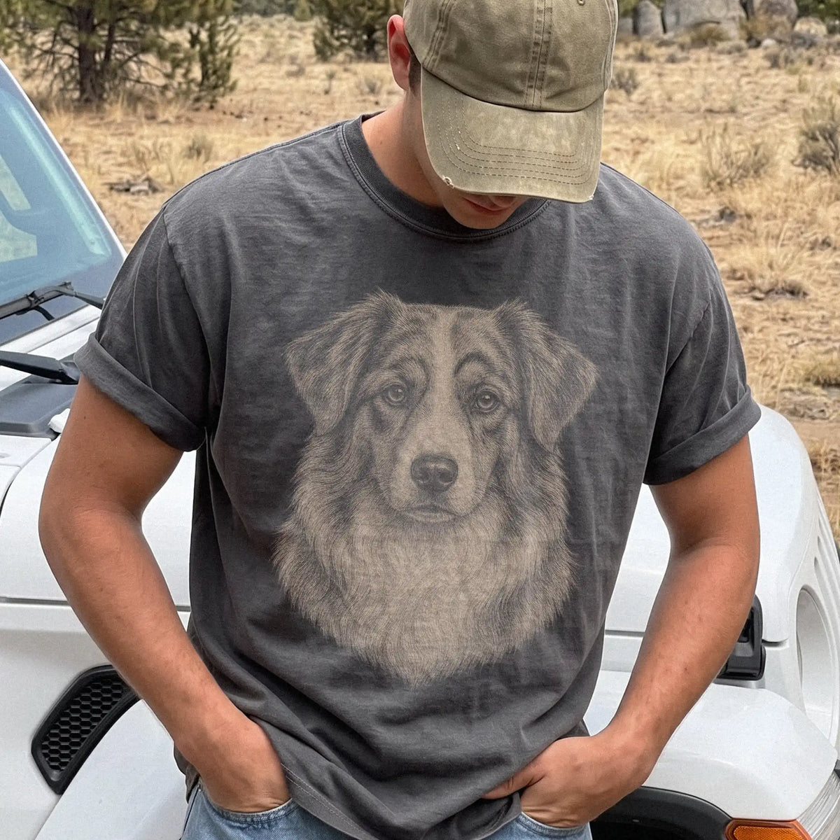 Model wearing a Pepper Comfort Colors® T-shirt with a realistic drawing of a Australian Shepherd
