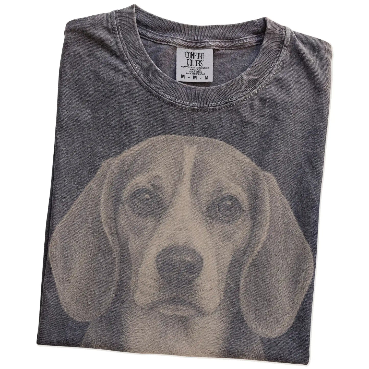 Folded Pepper Comfort Colors® T-shirt showing a realistic drawing of a Beagle