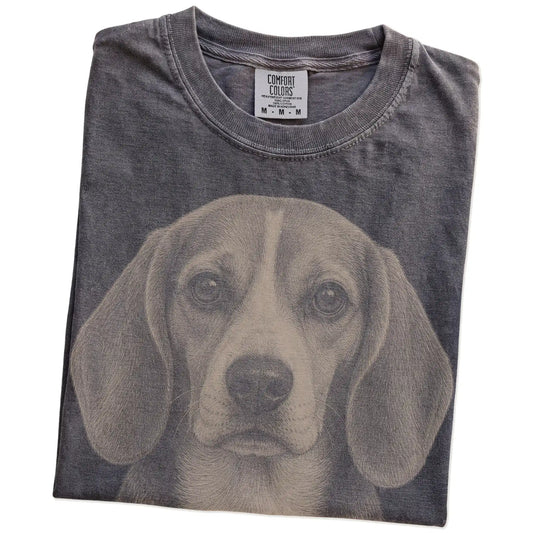 Folded Pepper Comfort Colors® T-shirt showing a realistic drawing of a Beagle
