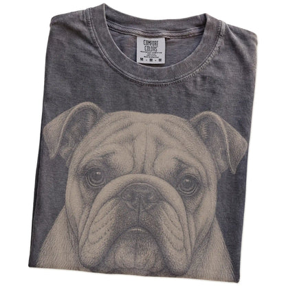 Folded Pepper Comfort Colors® T-shirt showing a realistic drawing of a Bulldog
